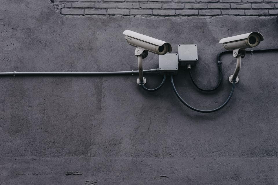 Security cameras mounted on a wall