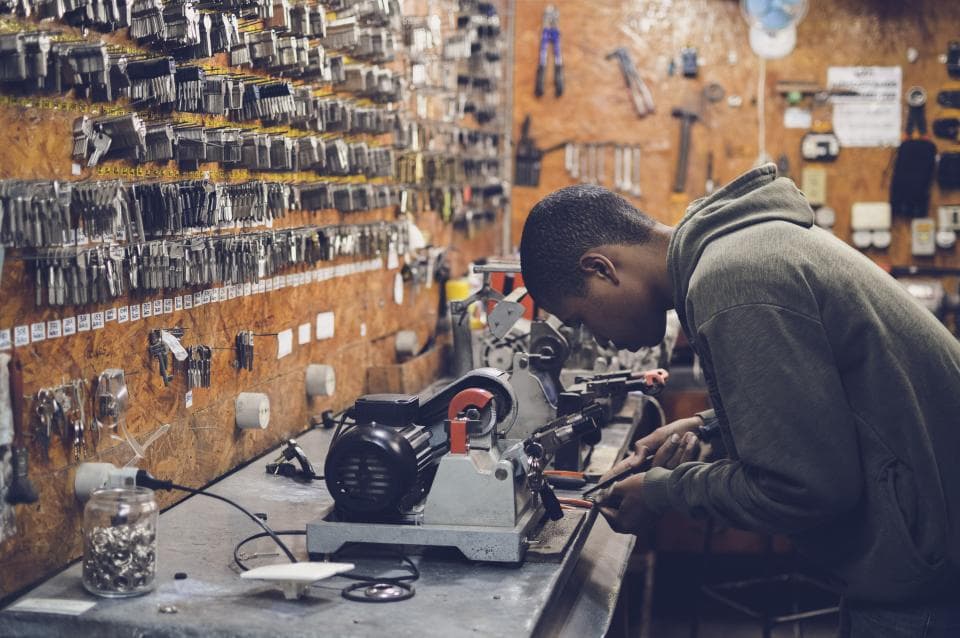 Technician repairing equipment in a workshop